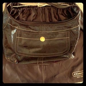 Burgundy patent coach purse